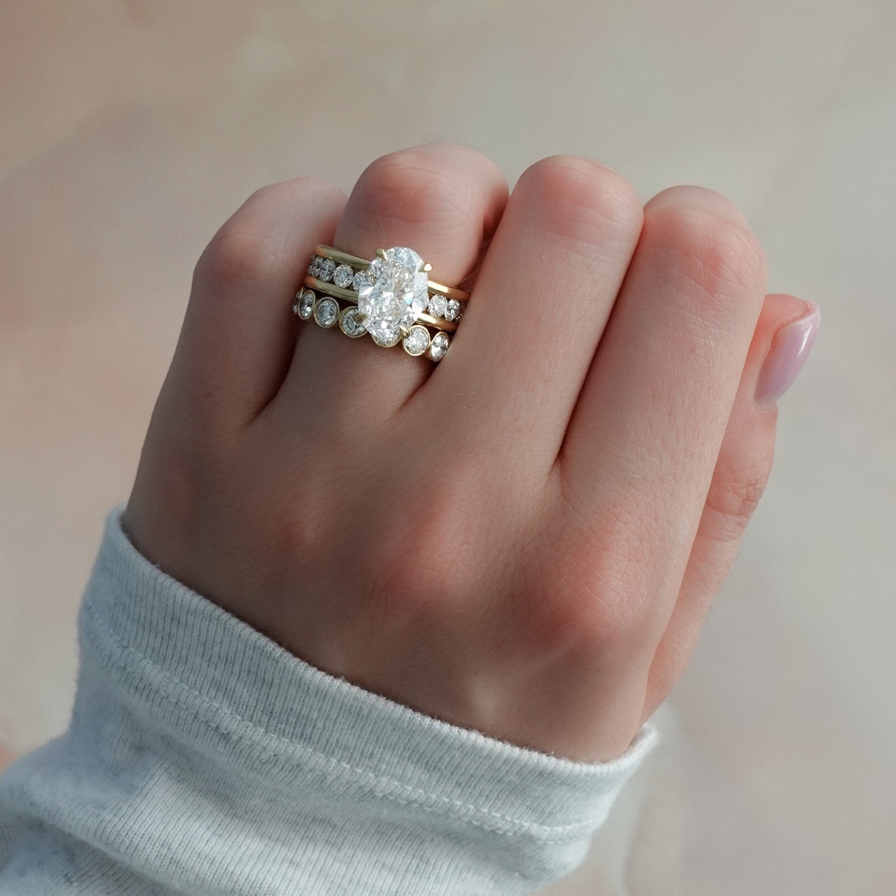 Chunky Channel Set Engagement Ring with Oval Cut Diamond