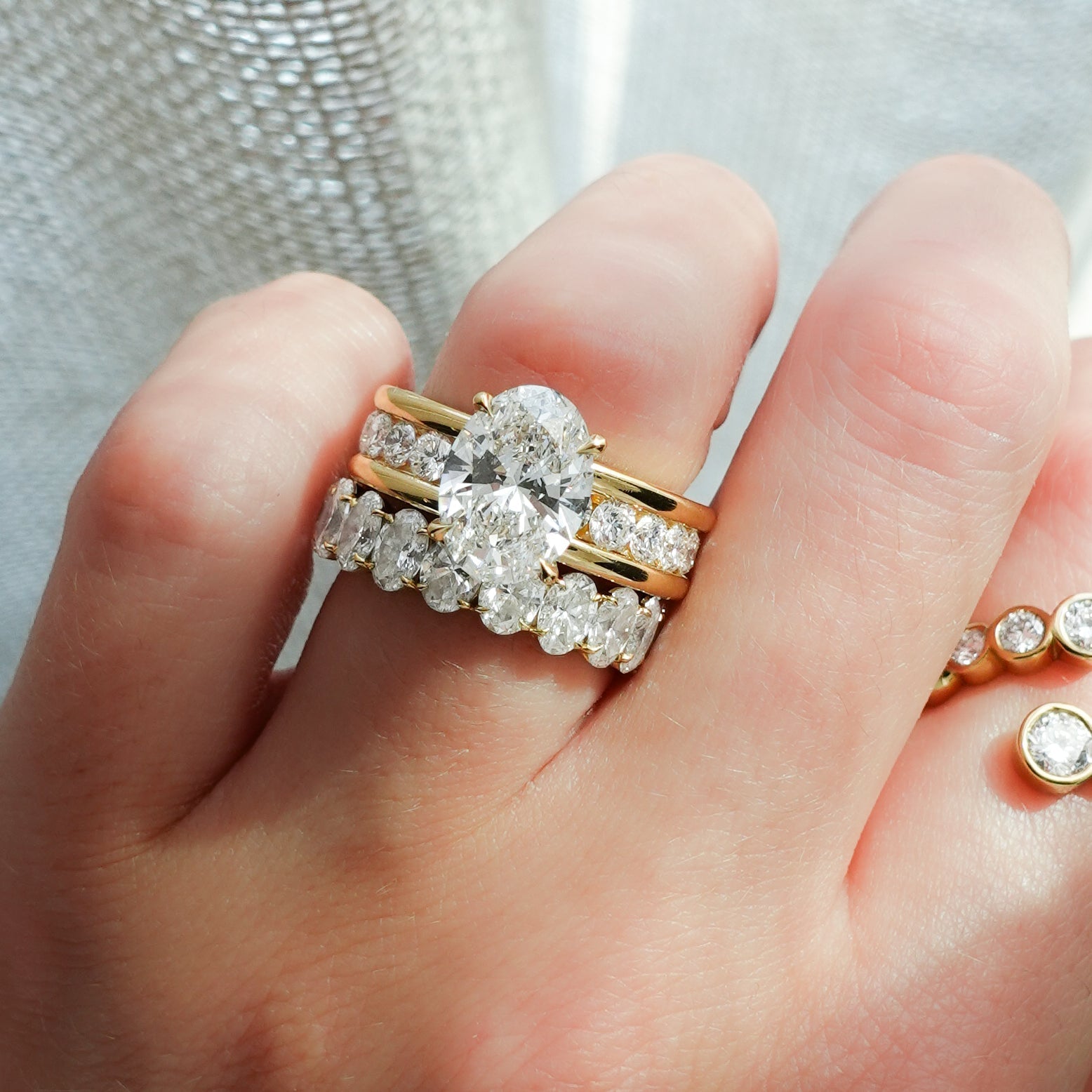Chunky Channel Set Engagement Ring with Oval Cut Diamond