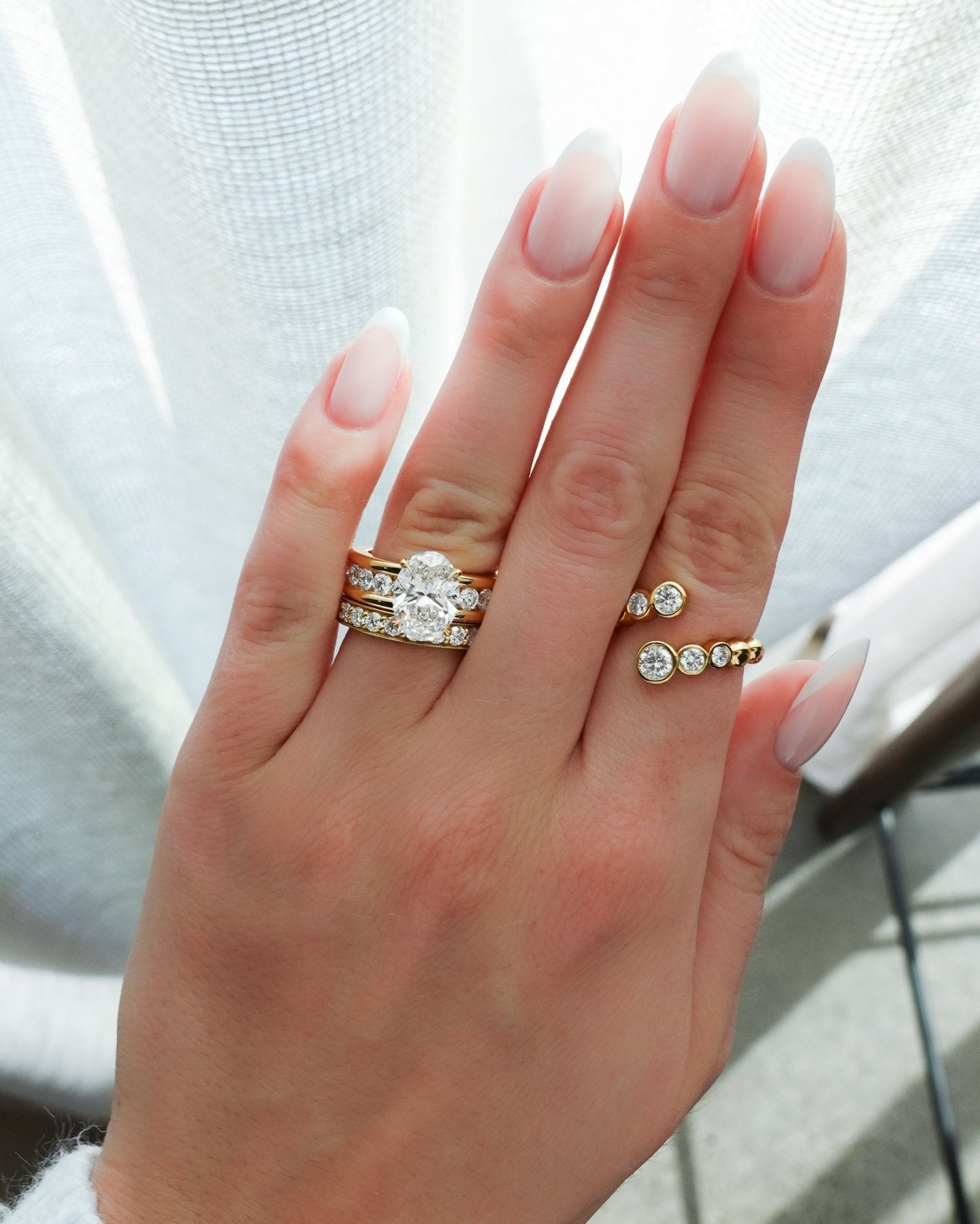 Chunky Channel Set Engagement Ring with Oval Cut Diamond