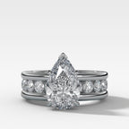 Chunky Channel Set Engagement Ring with Pear Cut Diamond