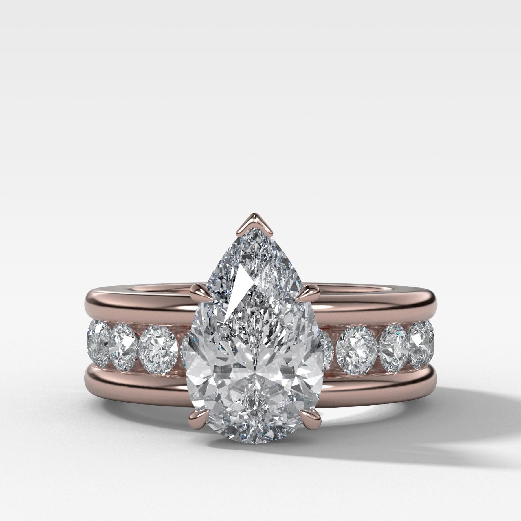 Chunky Channel Set Engagement Ring with Pear Cut Diamond