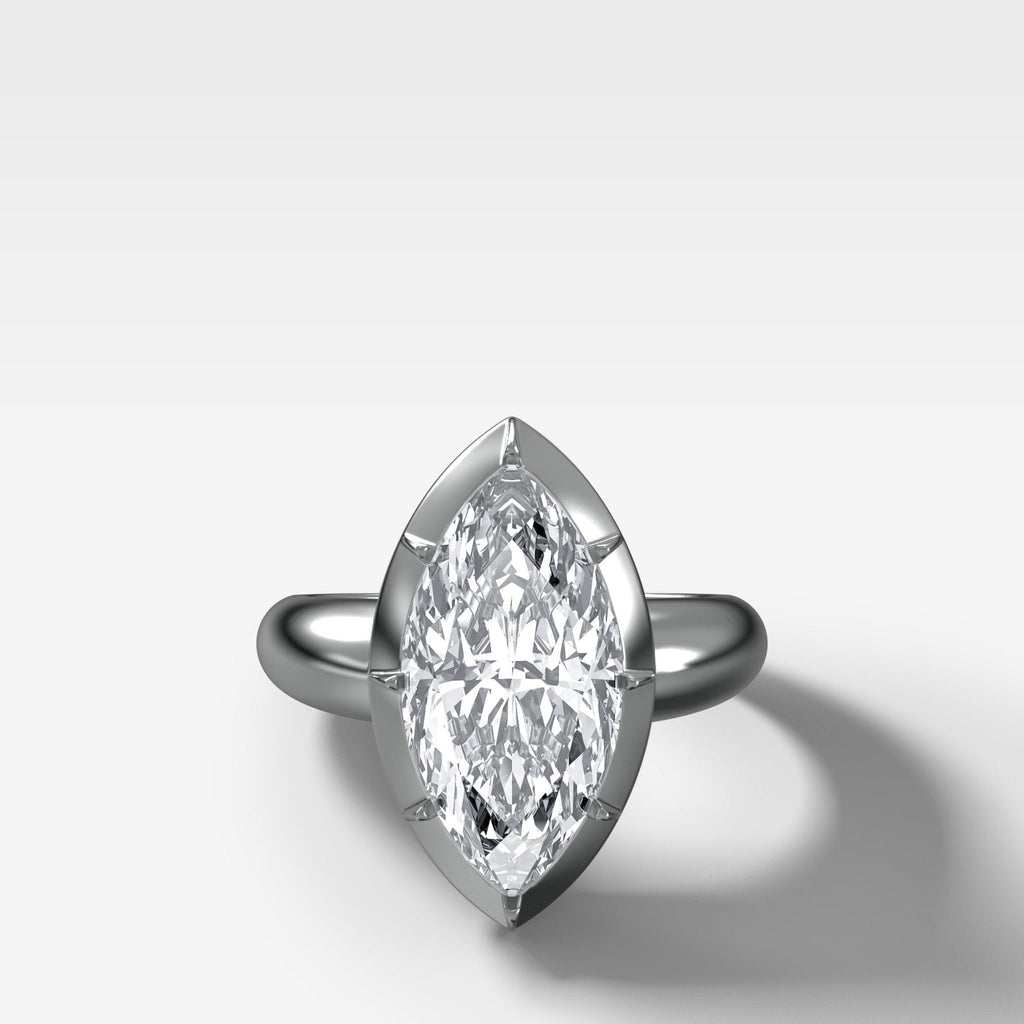 Club Button Back Engagement Ring with a Marquise Cut Diamond