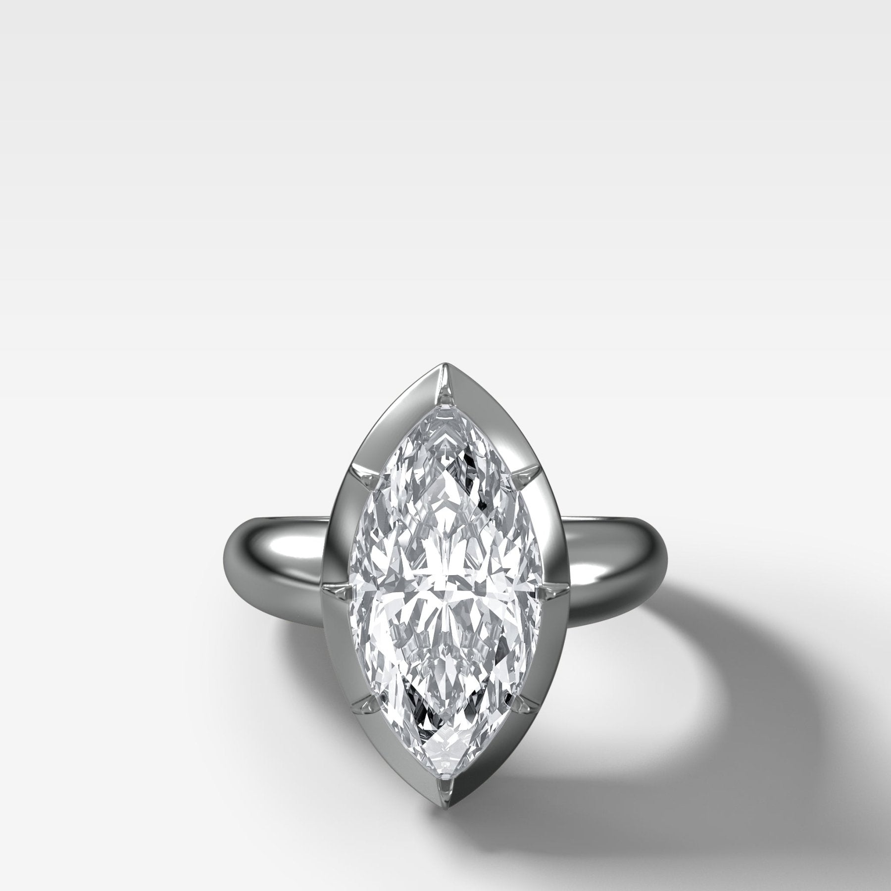 Club Button Back Engagement Ring with a Marquise Cut Diamond