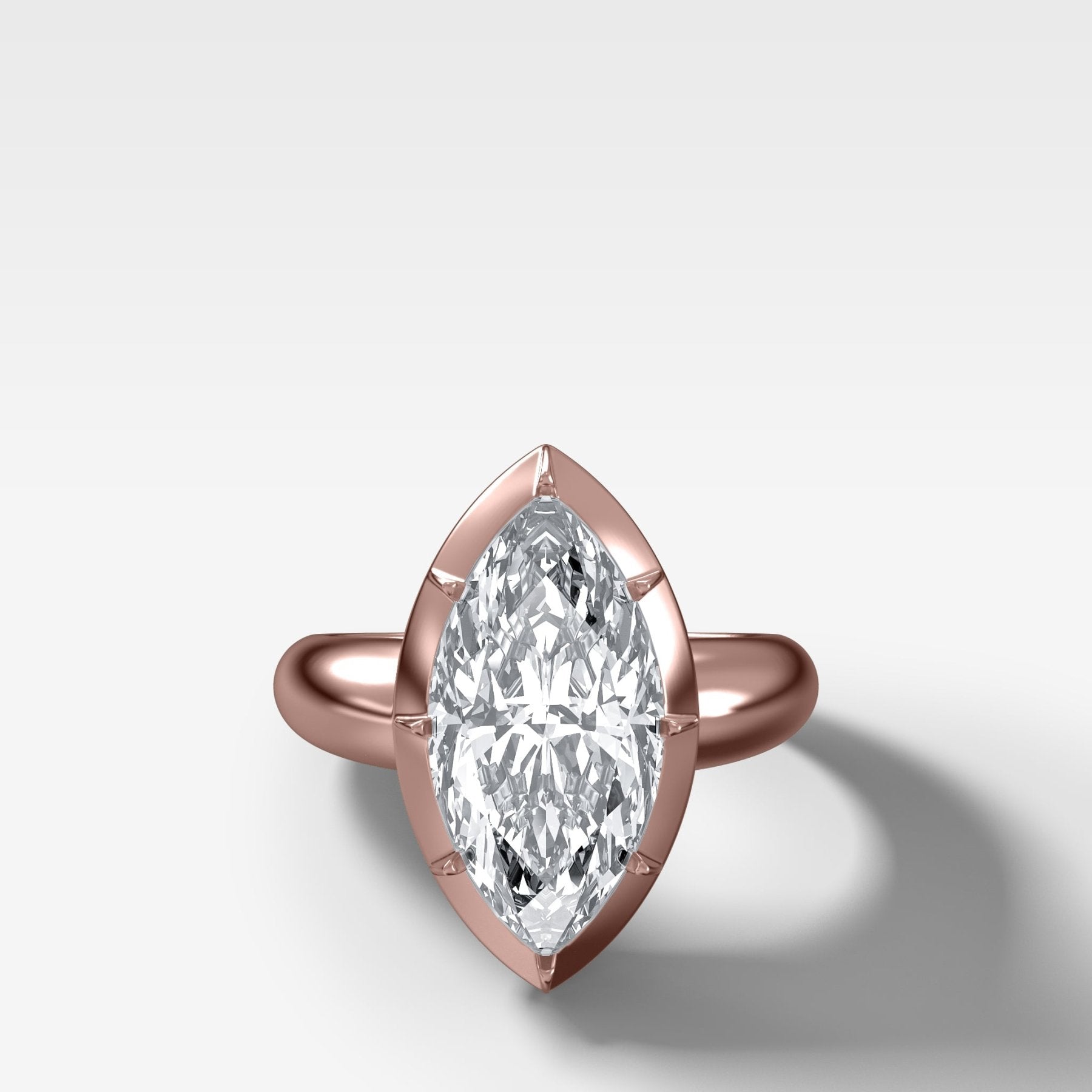 Club Button Back Engagement Ring with a Marquise Cut Diamond