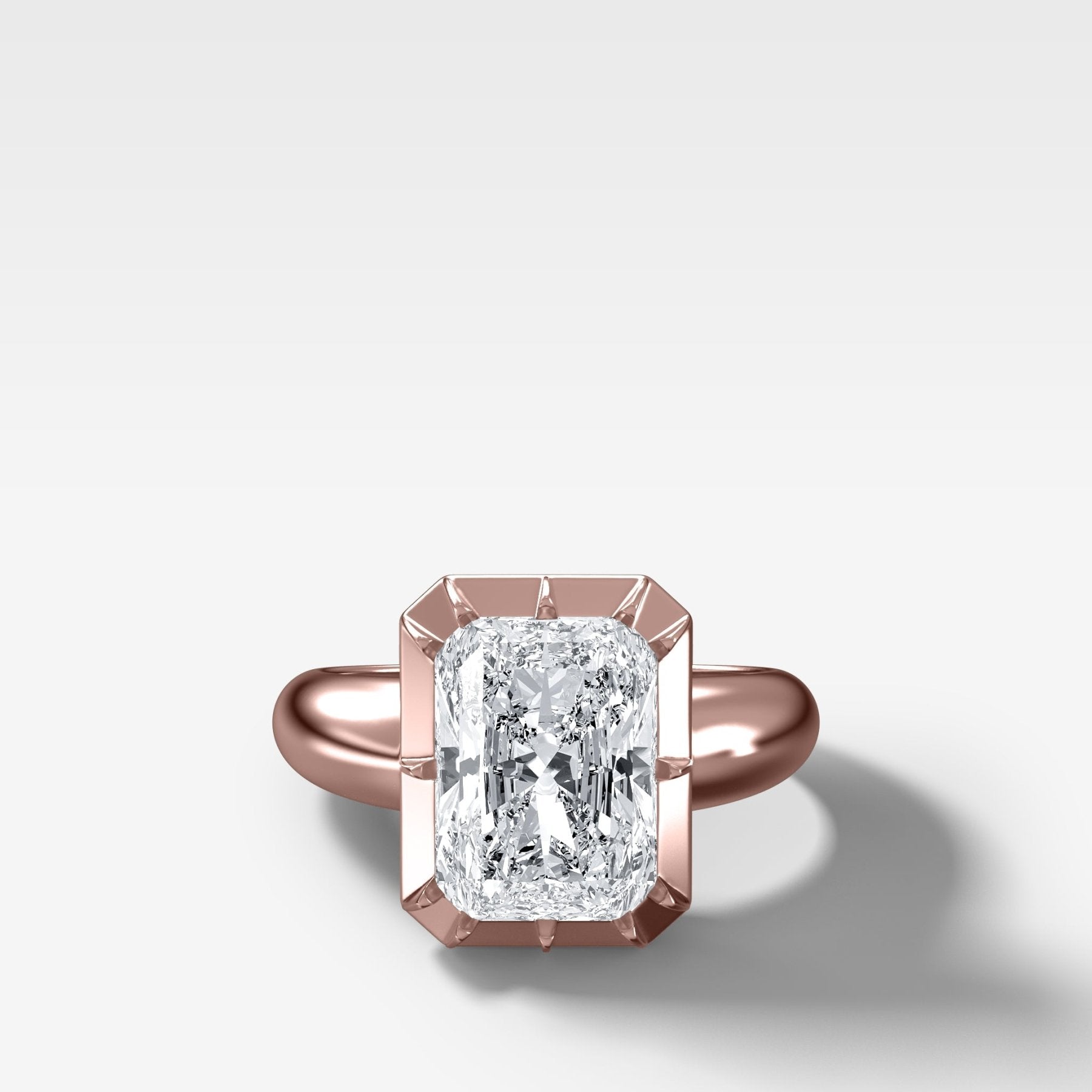 Club Button Back Engagement Ring with an Elongated Radiant Cut Diamond