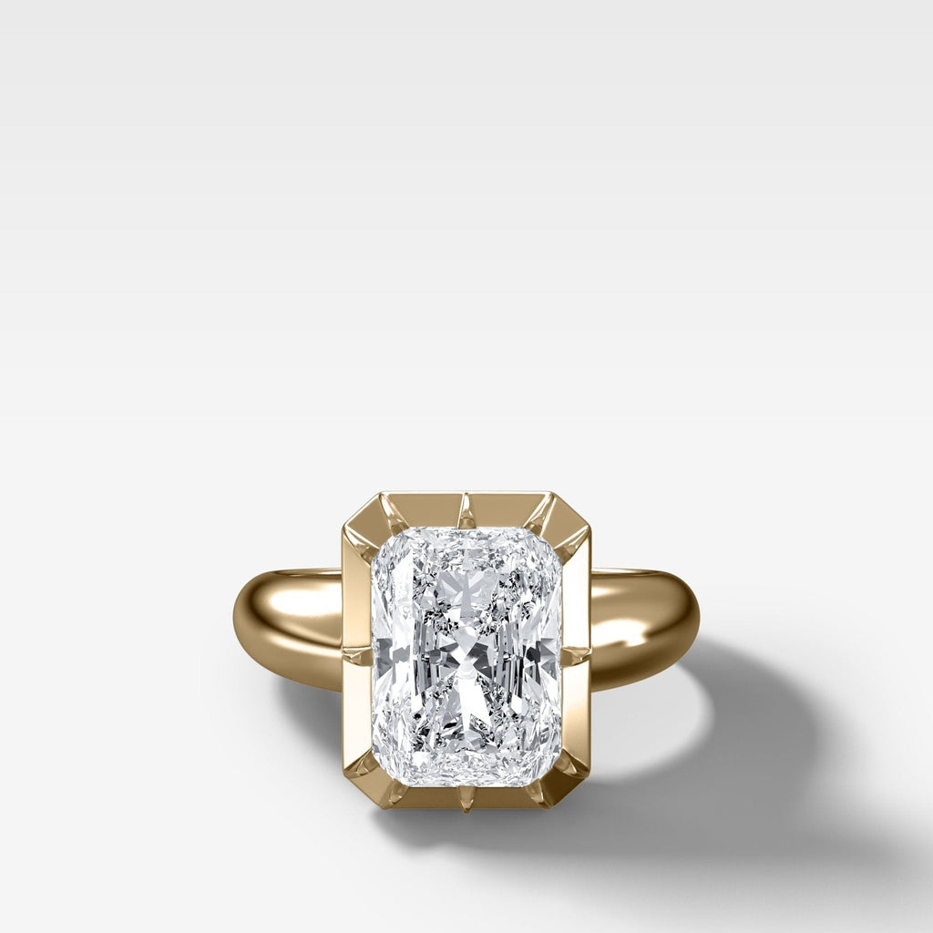 Club Button Back Engagement Ring with an Elongated Radiant Cut Diamond