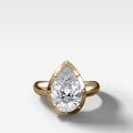 Club Button Back Engagement Ring with a Pear Cut Diamond