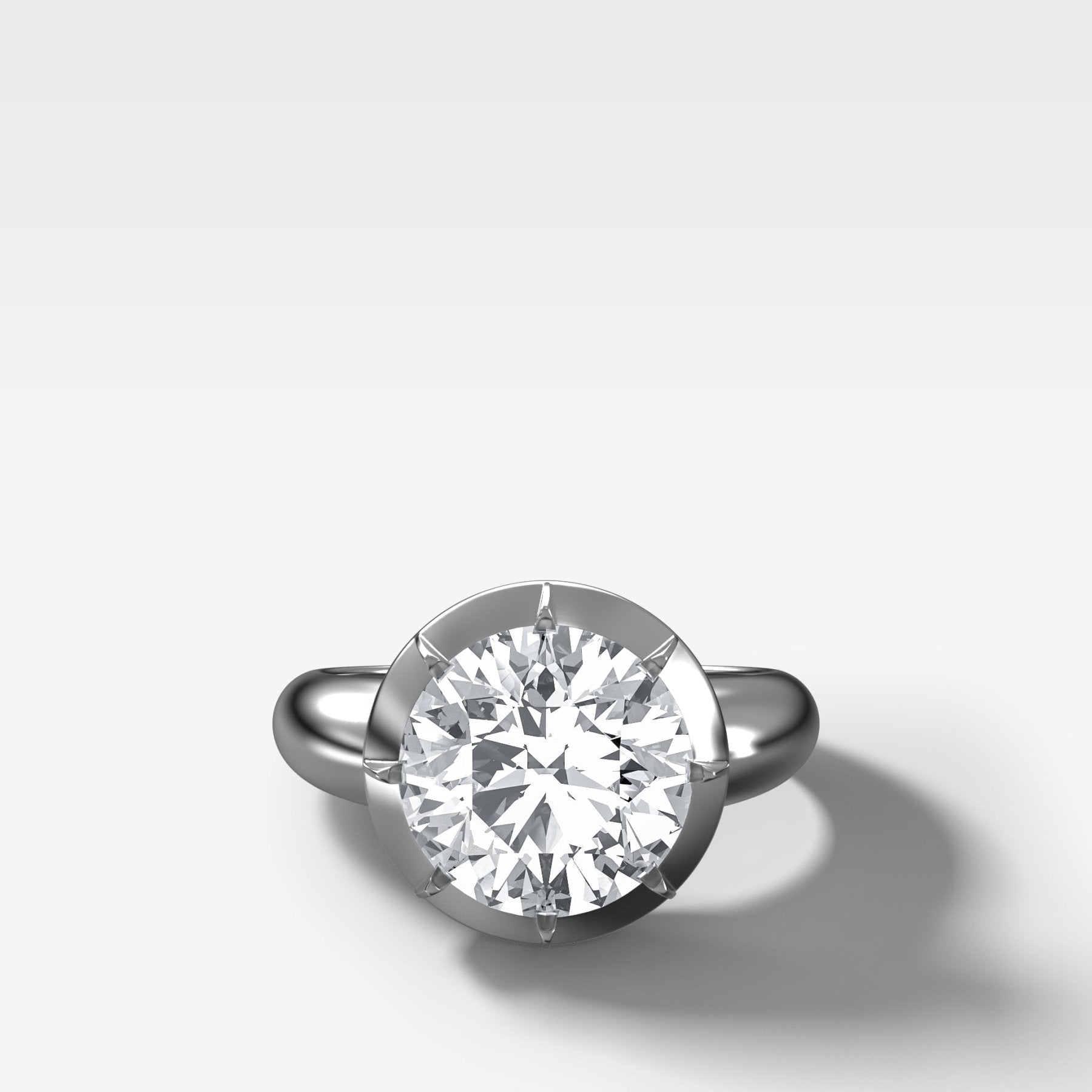 Club Button Back Engagement Ring with a Round Cut Diamond