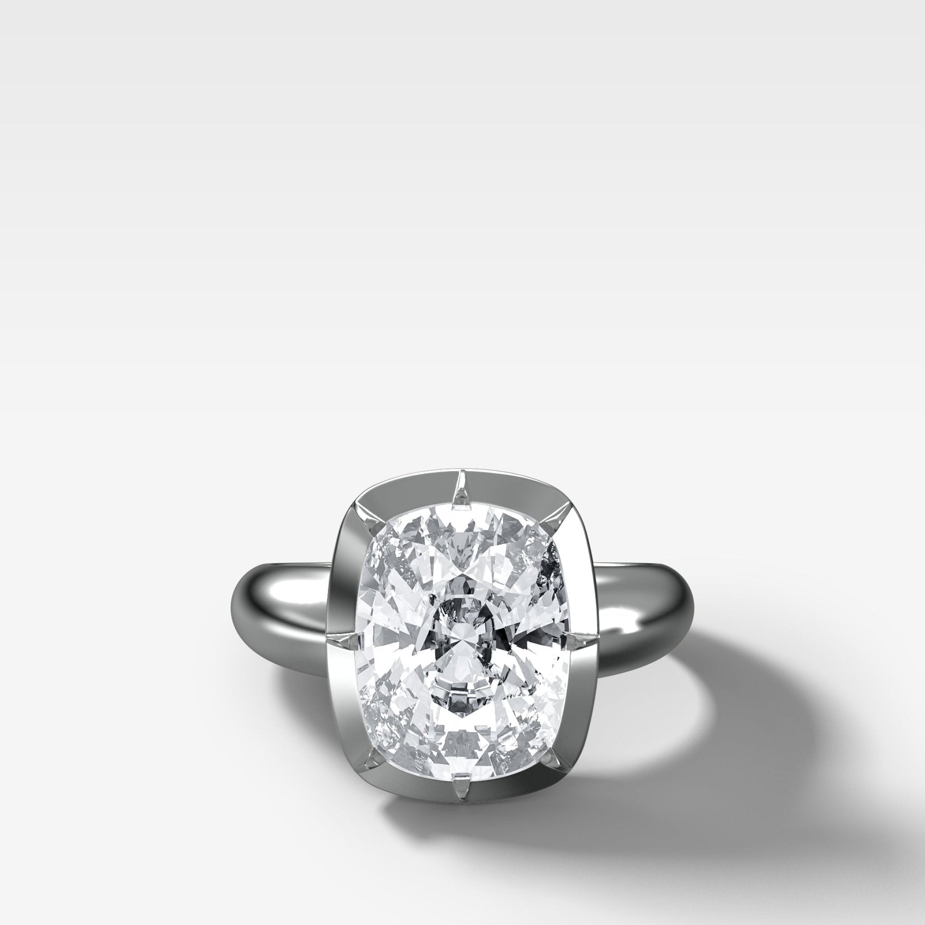 Club Button Back Engagement Ring with an Elongated Cushion Cut Diamond