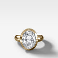 Club Button Back Engagement Ring with an Oval Cut Diamond