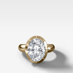 Club Button Back Engagement Ring with an Oval Cut Diamond