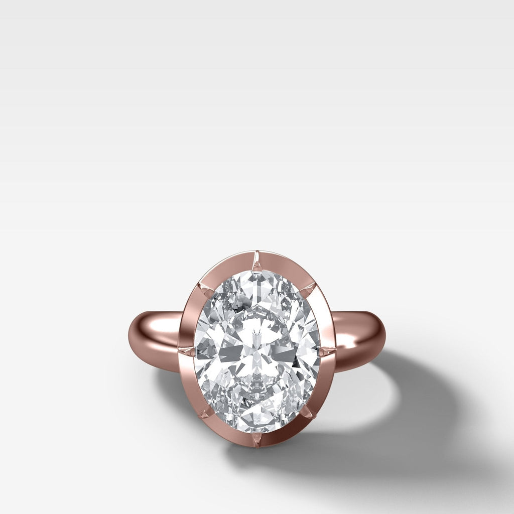 Club Button Back Engagement Ring with an Oval Cut Diamond