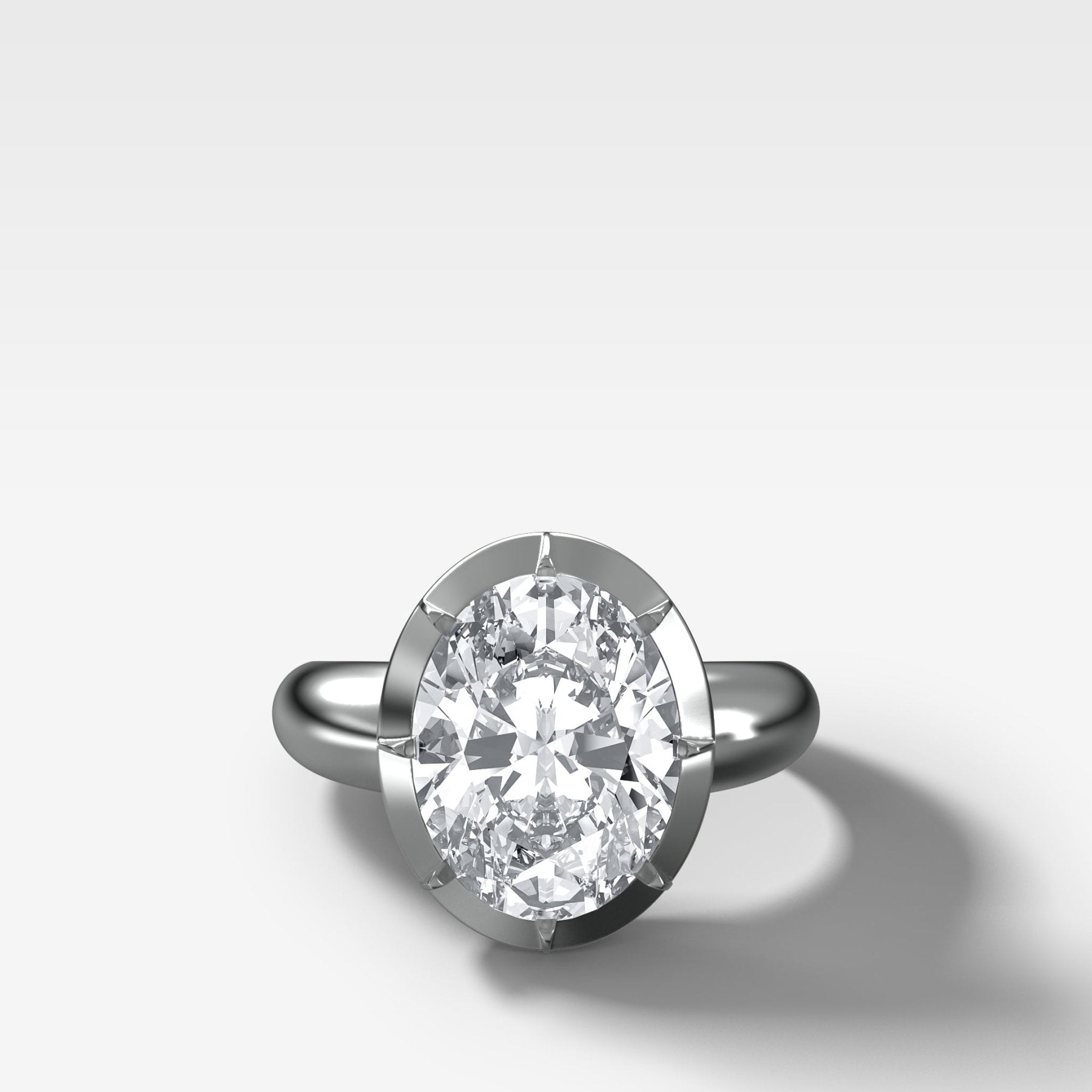 Club Button Back Engagement Ring with an Oval Cut Diamond