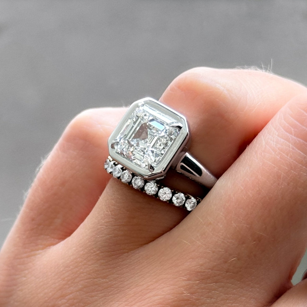Club Ring Solitaire Engagement Ring With an Asscher Cut Diamond