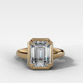 Club Ring Solitaire Engagement Ring With an Emerald Cut Diamond