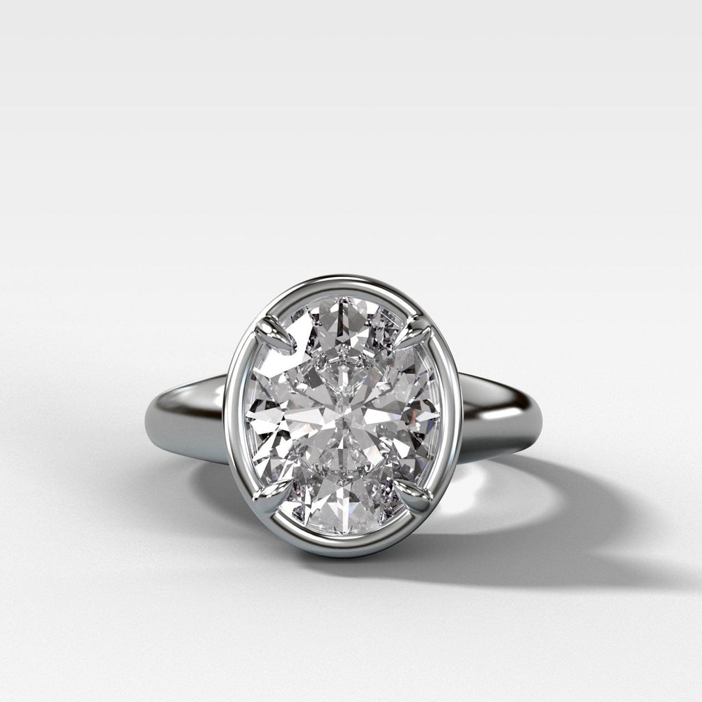 Club Ring Solitaire Engagement Ring With an Oval Cut Diamond