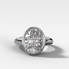 Club Ring Solitaire Engagement Ring With an Oval Cut Diamond