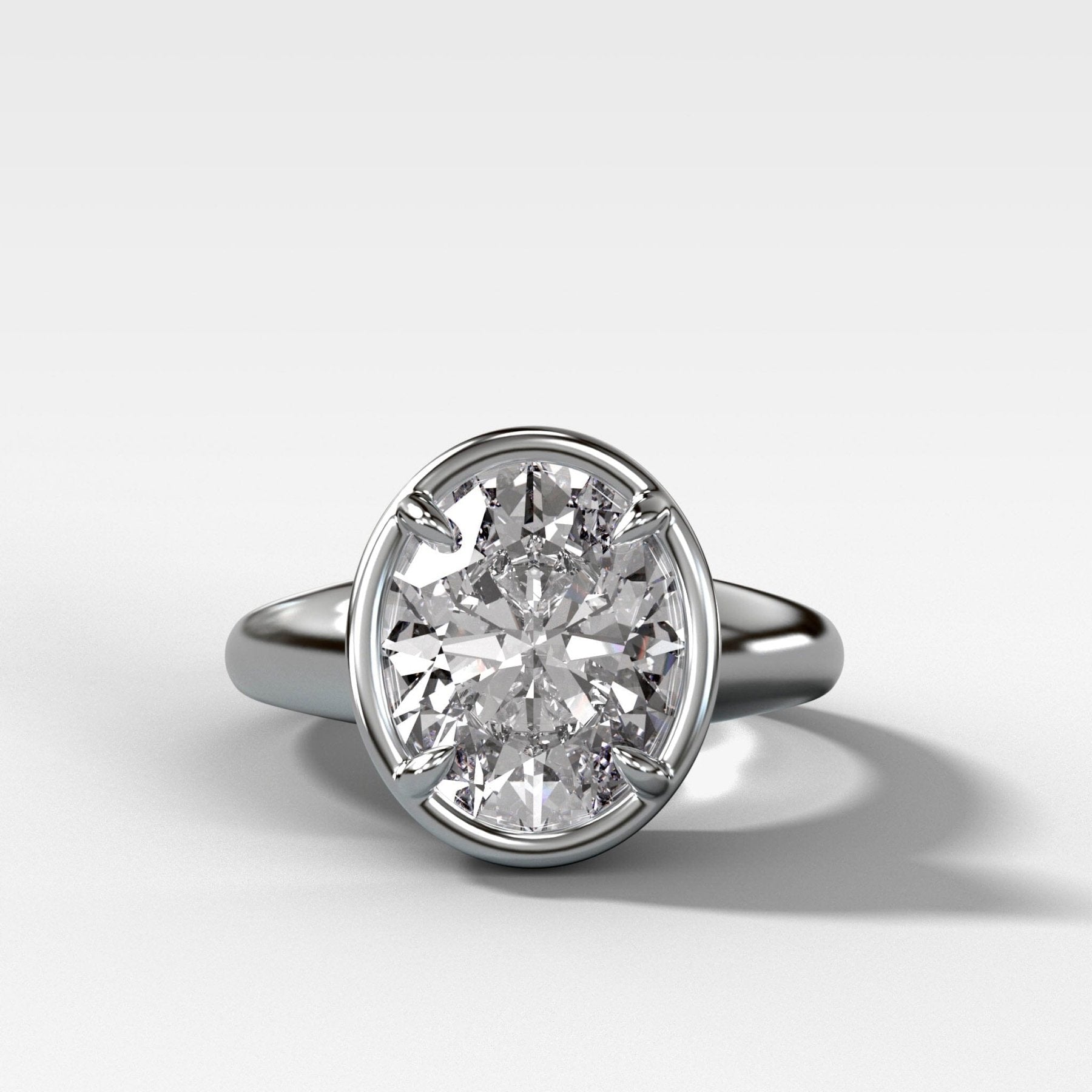 Club Ring Solitaire Engagement Ring With an Oval Cut Diamond