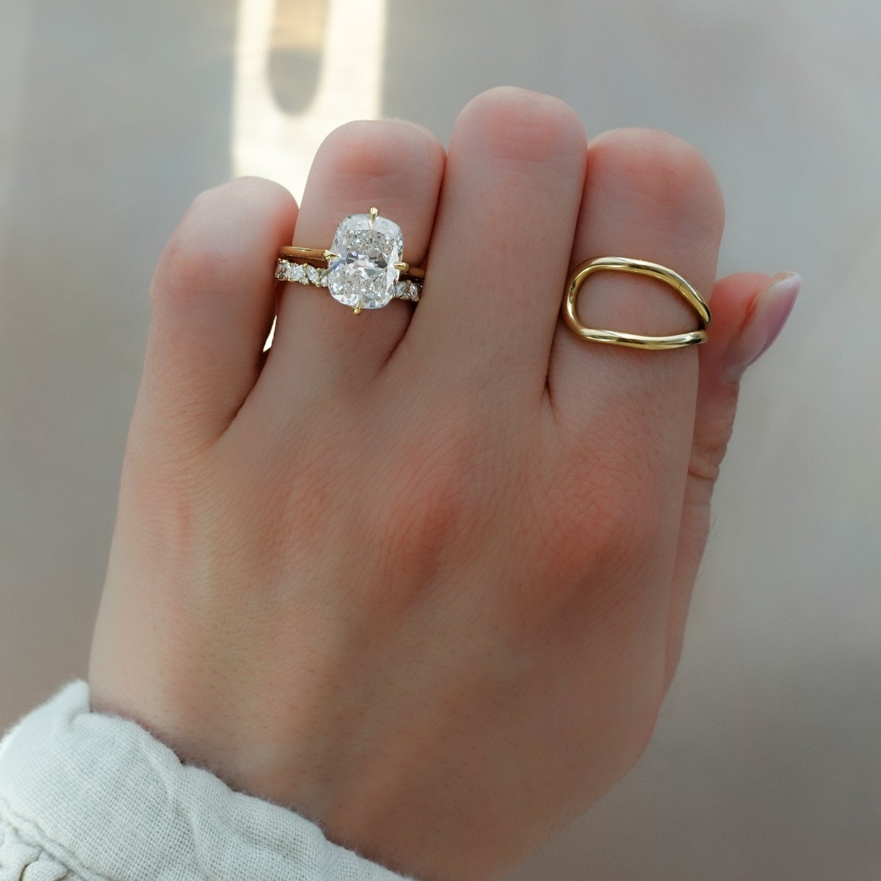 Compass Solitaire Engagement Ring with Elongated Cushion Cut Diamond