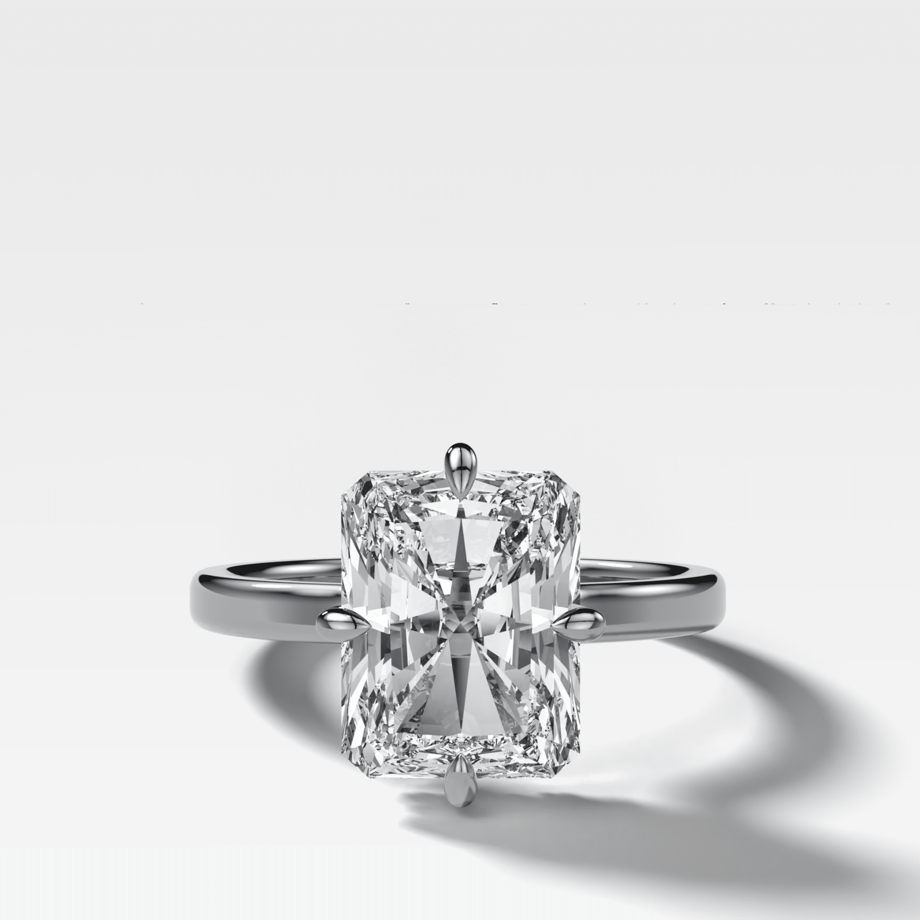 Compass Solitaire Engagement Ring with Elongated Radiant Cut Diamond