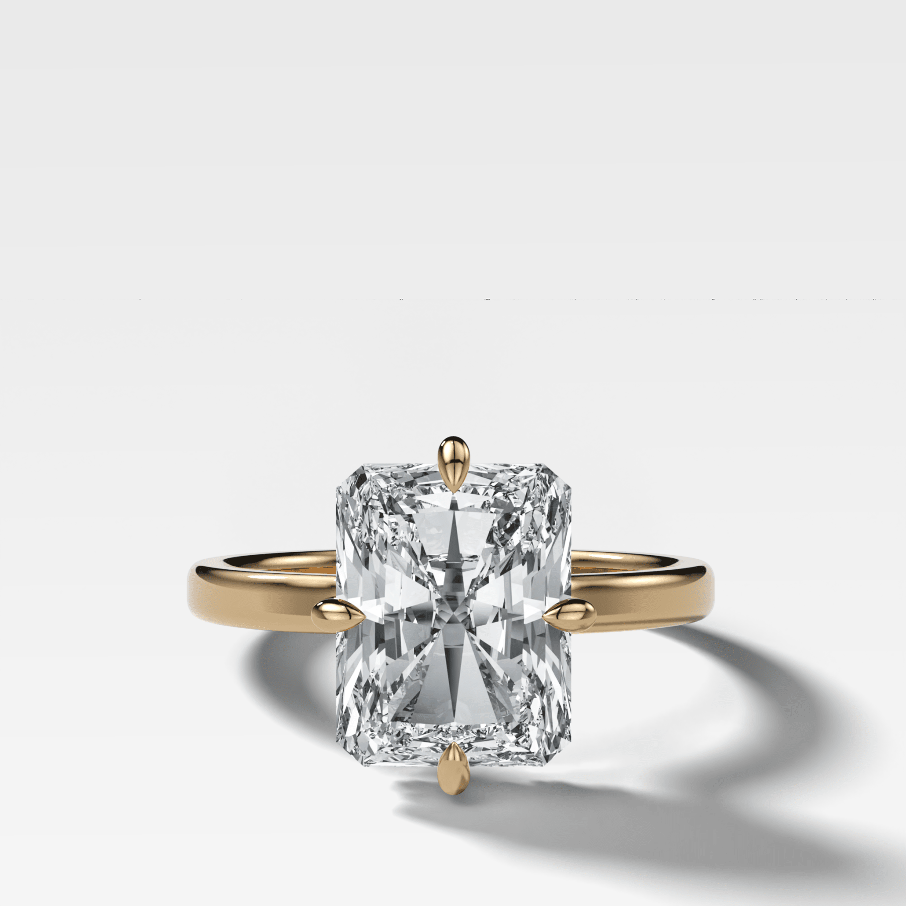Compass Solitaire Engagement Ring with Elongated Radiant Cut Diamond