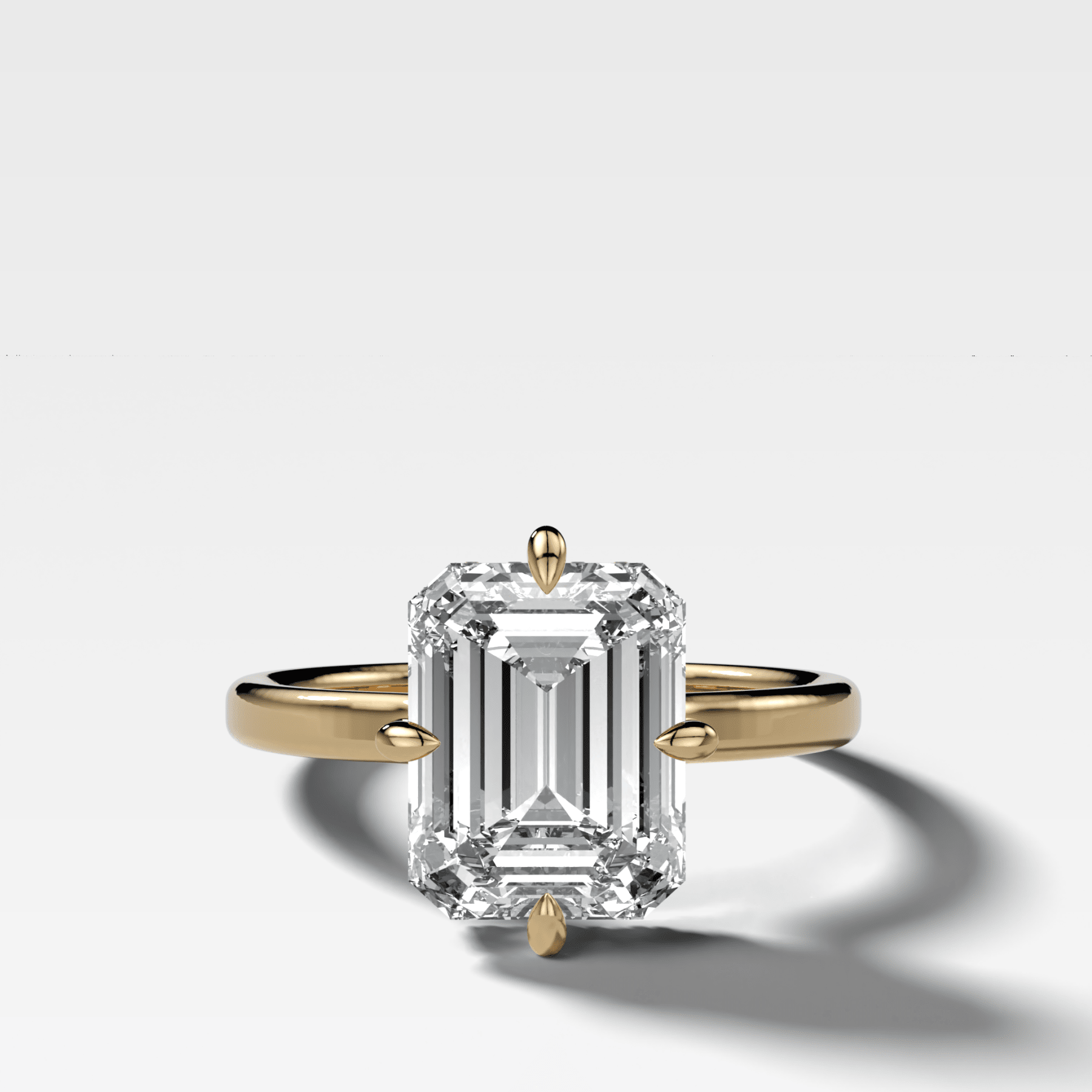 Compass Solitaire Engagement Ring with Emerald Cut Diamond
