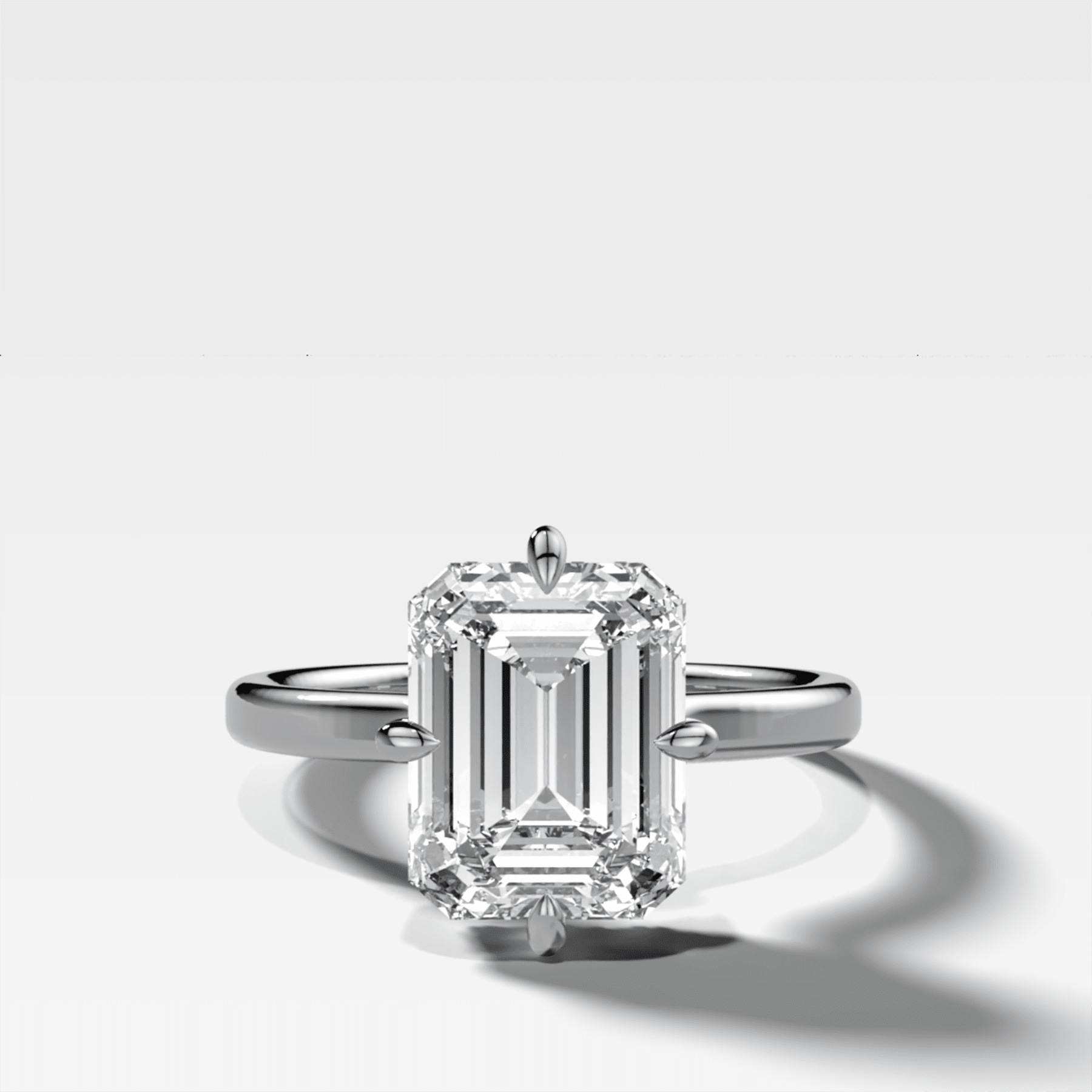 Compass Solitaire Engagement Ring with Emerald Cut Diamond