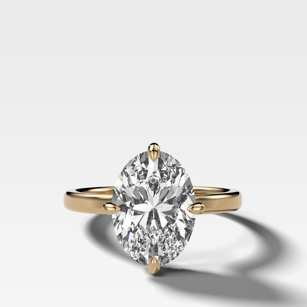 Compass Solitaire Engagement Ring with Oval Cut Diamond