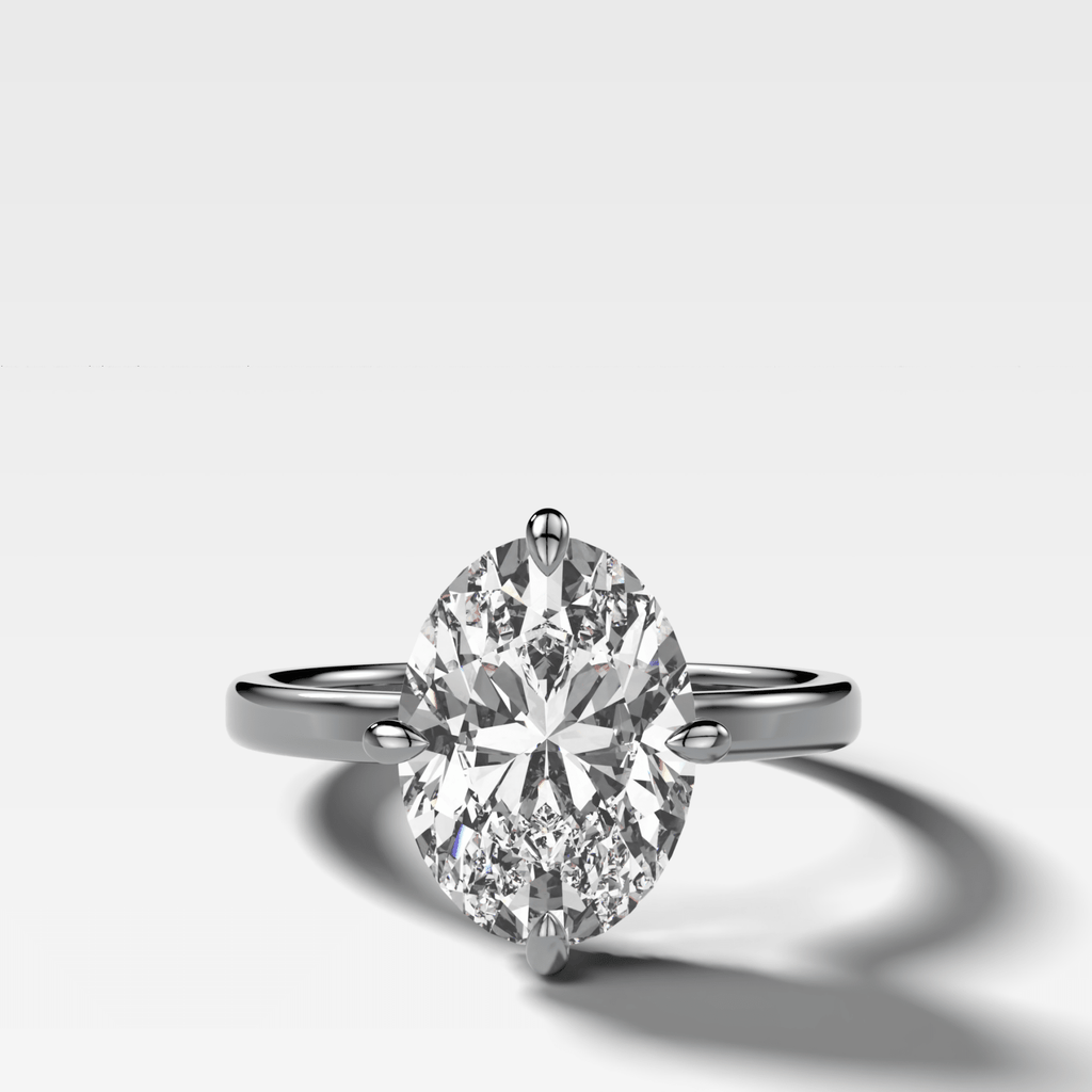 Compass Solitaire Engagement Ring with Oval Cut Diamond