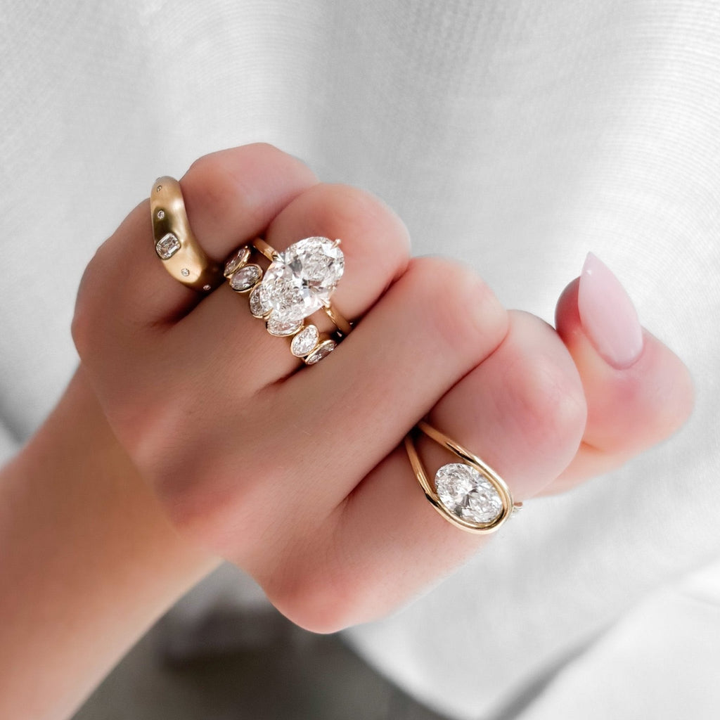 Compass Solitaire Engagement Ring with Oval Cut Diamond
