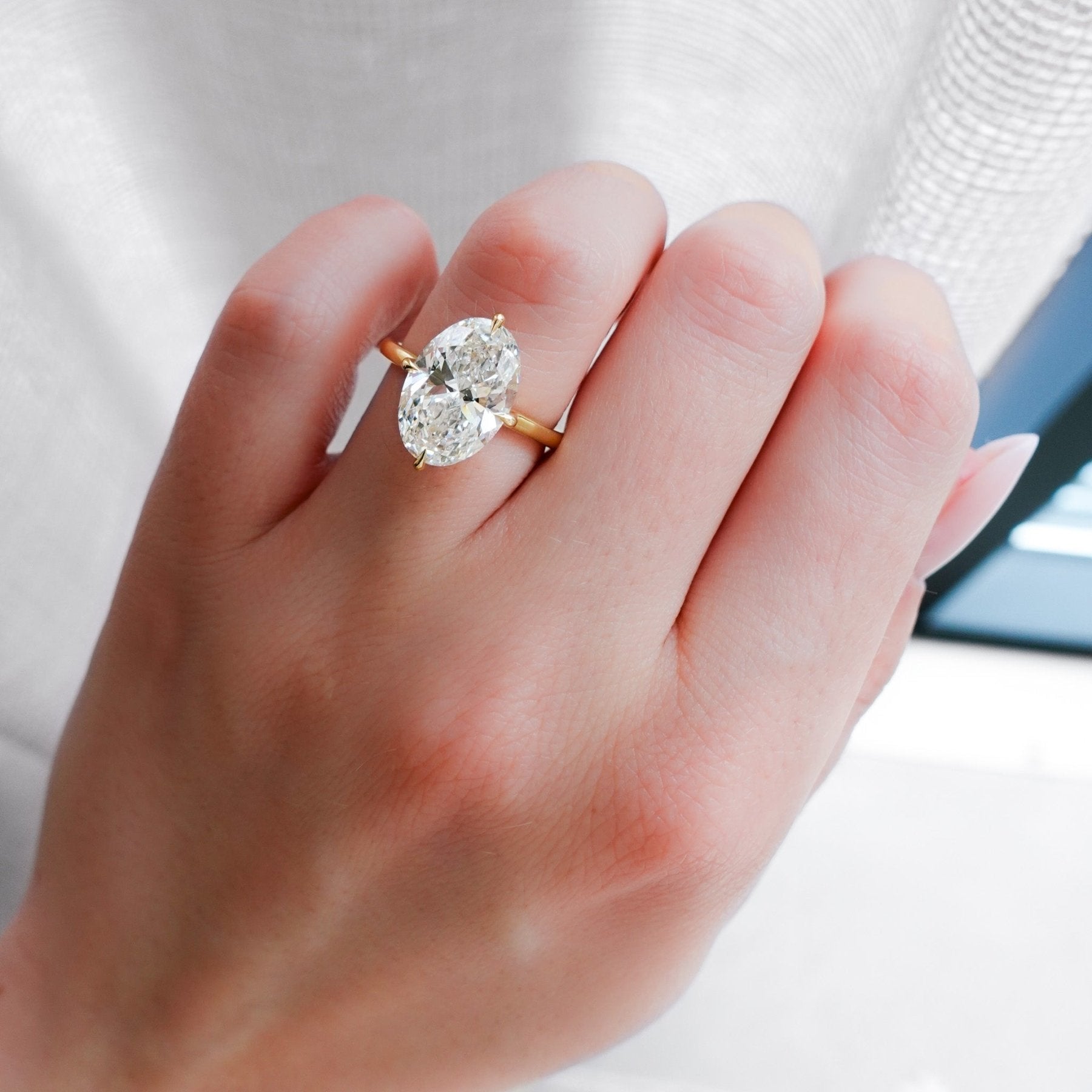 Compass Solitaire Engagement Ring with Oval Cut Diamond