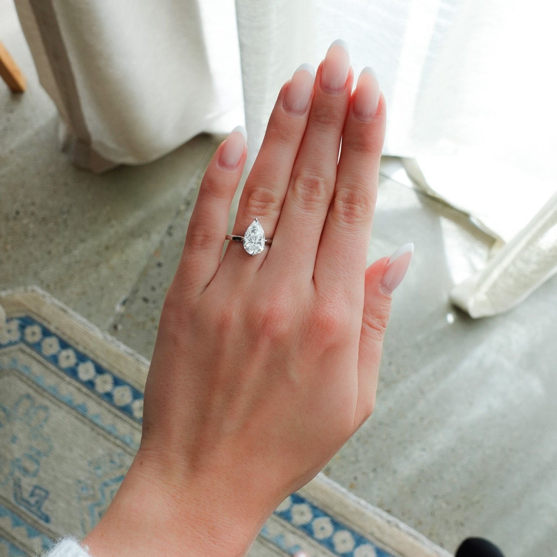Compass Solitaire Engagement Ring with Pear Cut Diamond