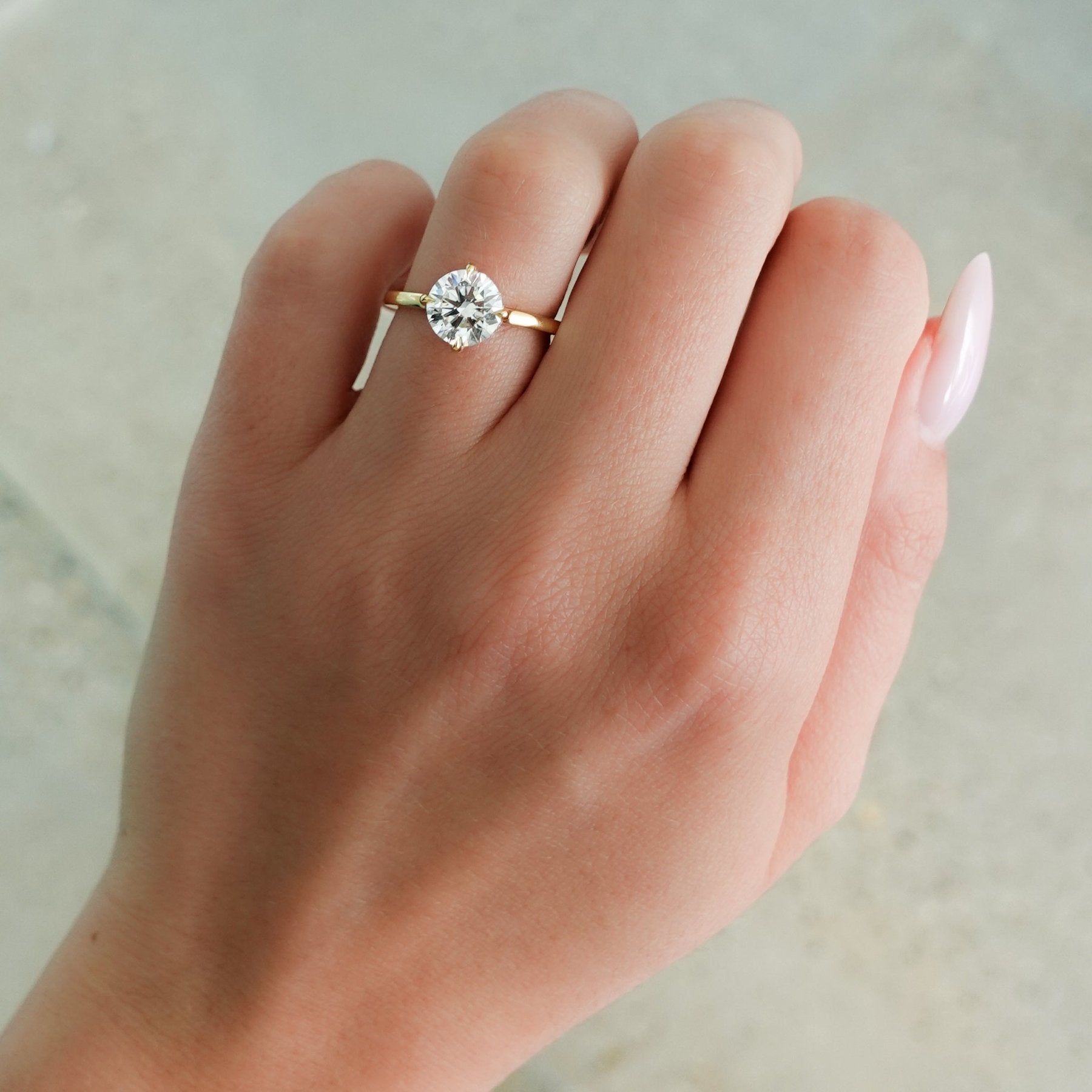 Compass Solitaire Engagement Ring with Round Cut Diamond