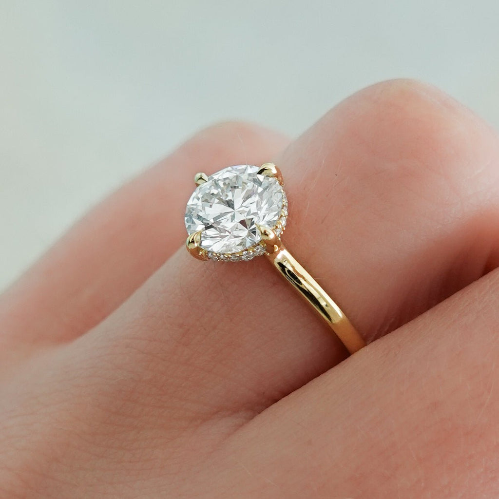 Compass Solitaire Engagement Ring with Round Cut Diamond