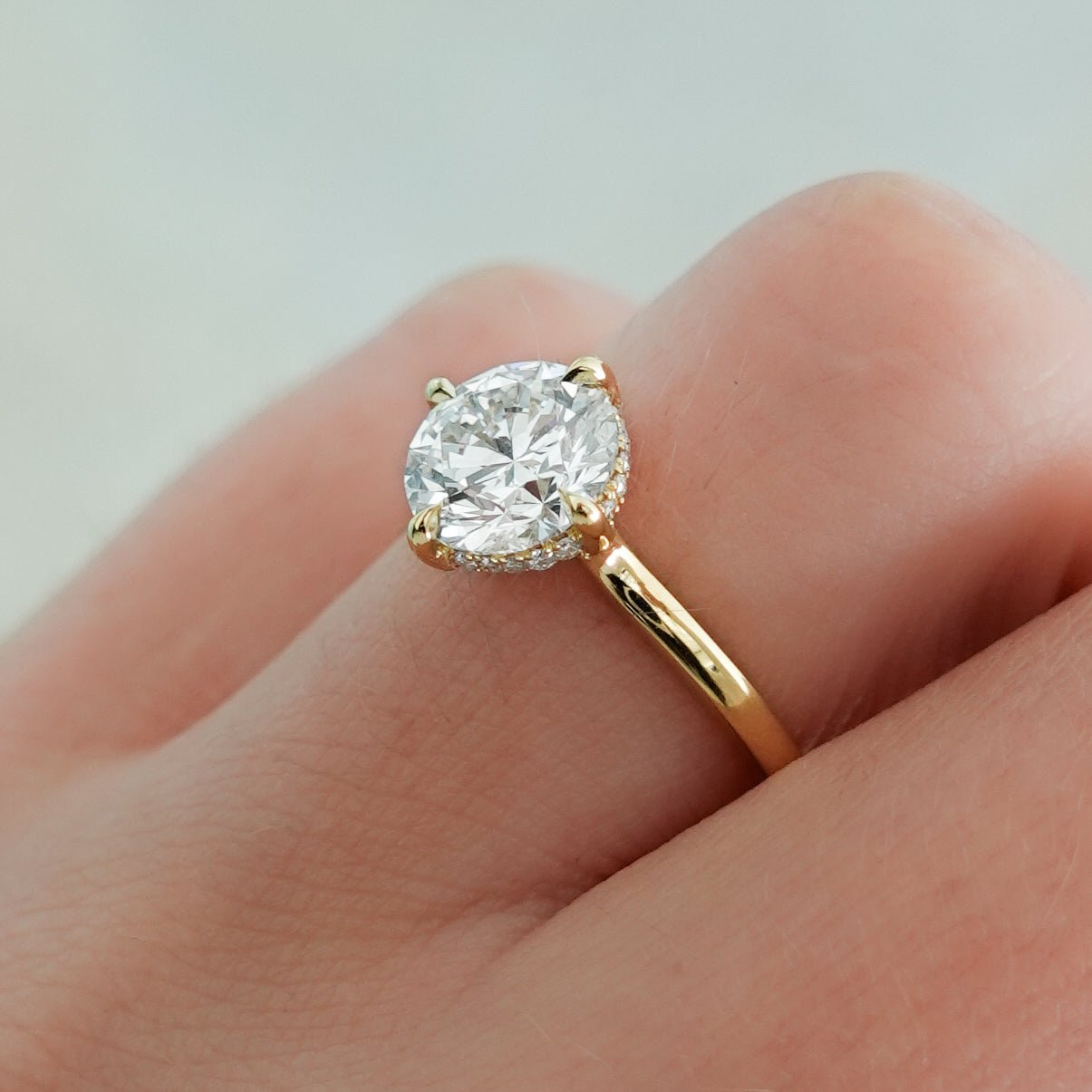 Compass Solitaire Engagement Ring with Round Cut Diamond