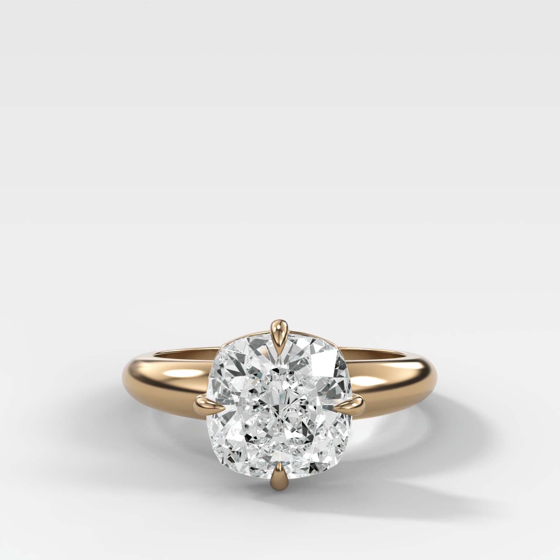 Compass Tapered Dome Engagement Ring With a Cushion Cut Diamond