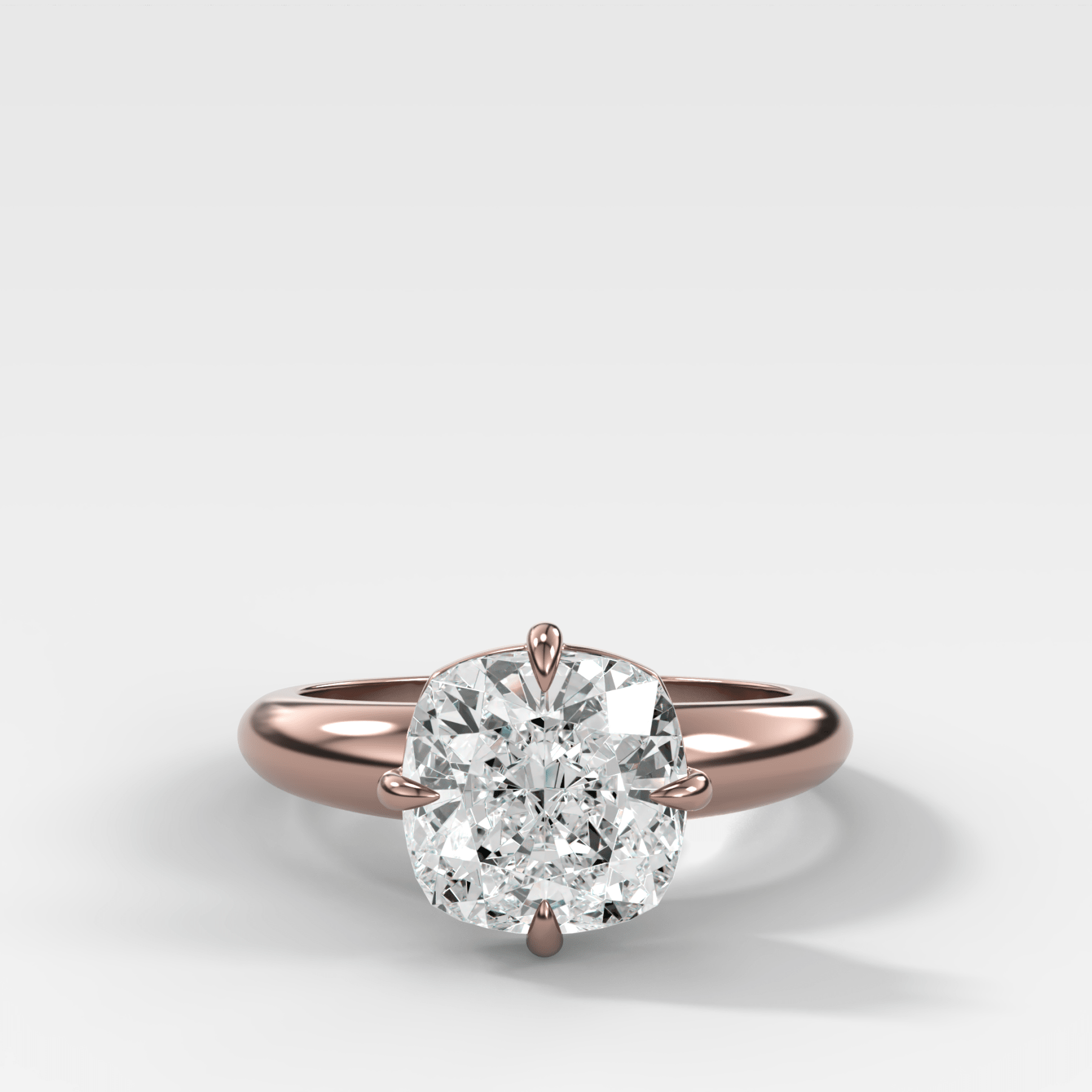 Compass Tapered Dome Engagement Ring With a Cushion Cut Diamond