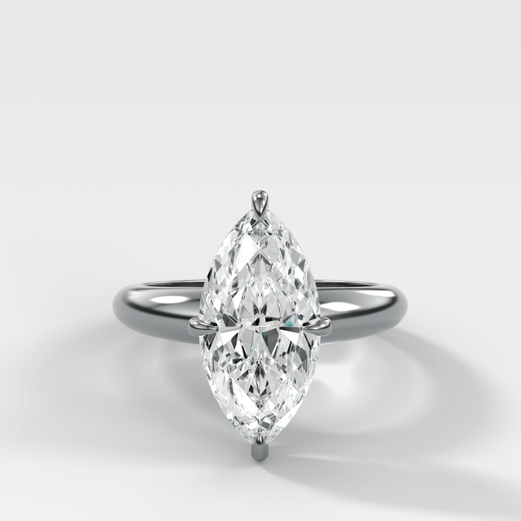 Compass Tapered Dome Engagement Ring With a Marquise Diamond