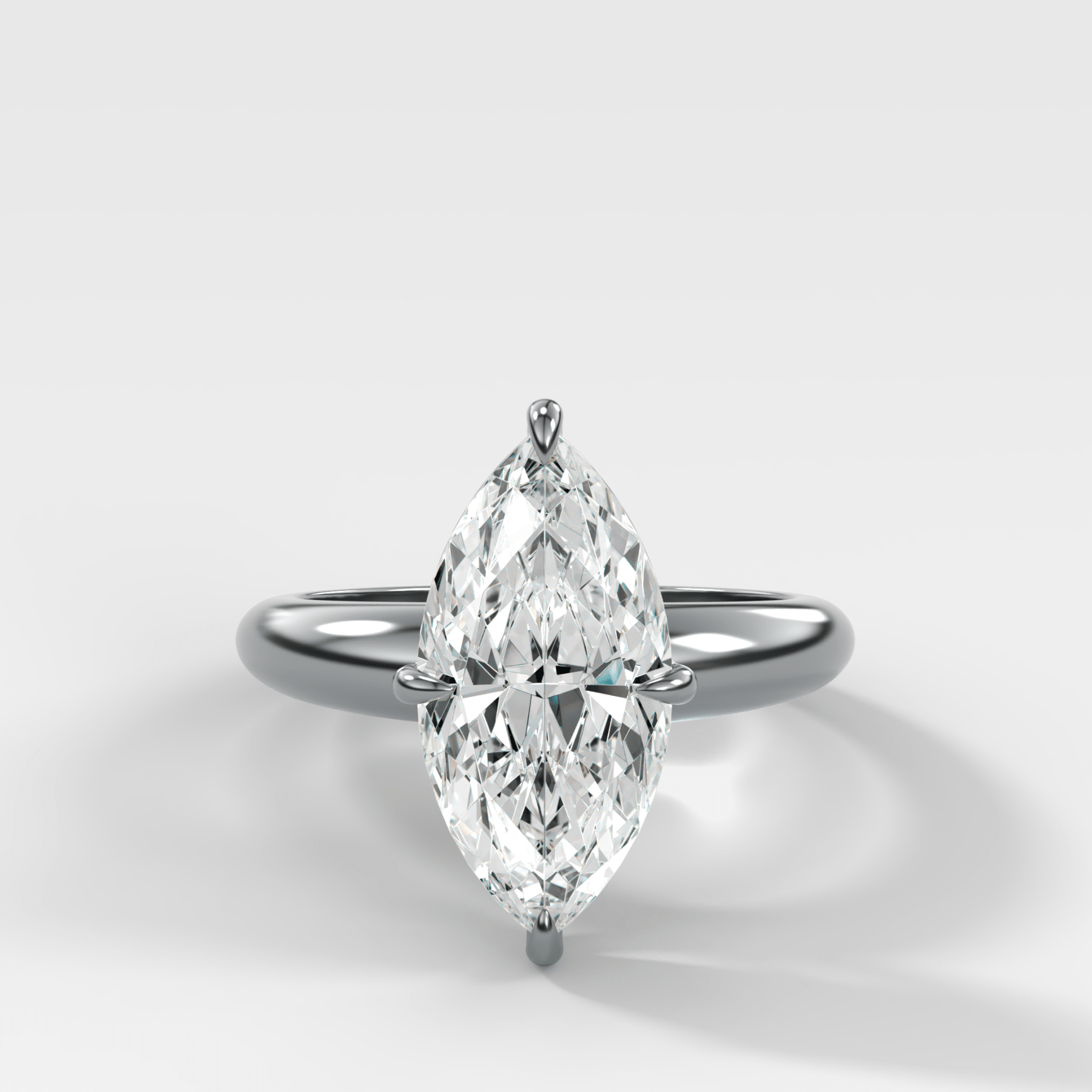 Compass Tapered Dome Engagement Ring With a Marquise Diamond