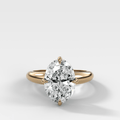 Compass Tapered Dome Engagement Ring With a Oval Diamond