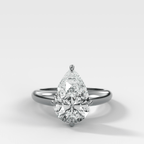 Compass Tapered Dome Engagement Ring With a Pear Diamond