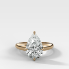 Compass Tapered Dome Engagement Ring With a Pear Diamond