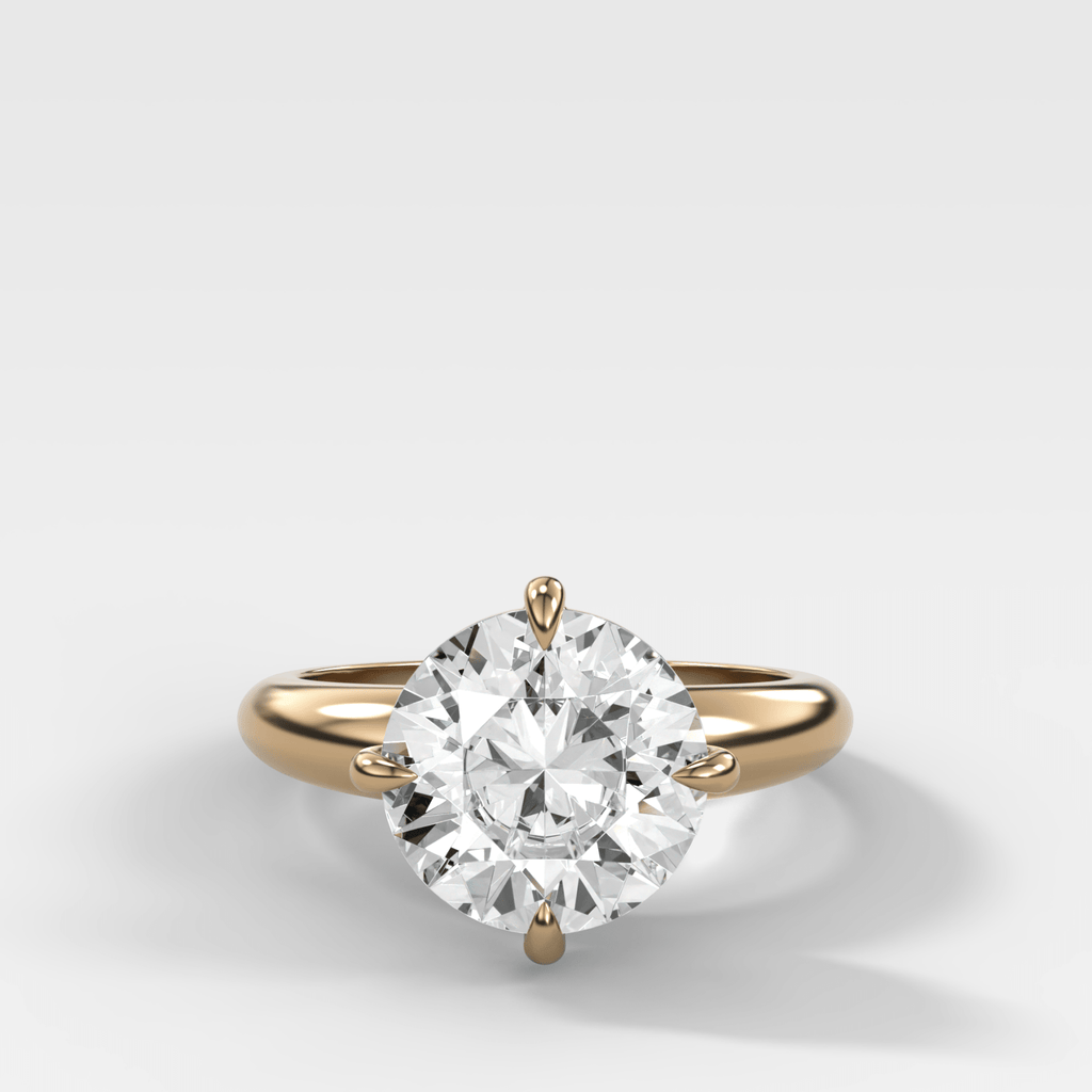 Compass Tapered Dome Engagement Ring With a Round Diamond