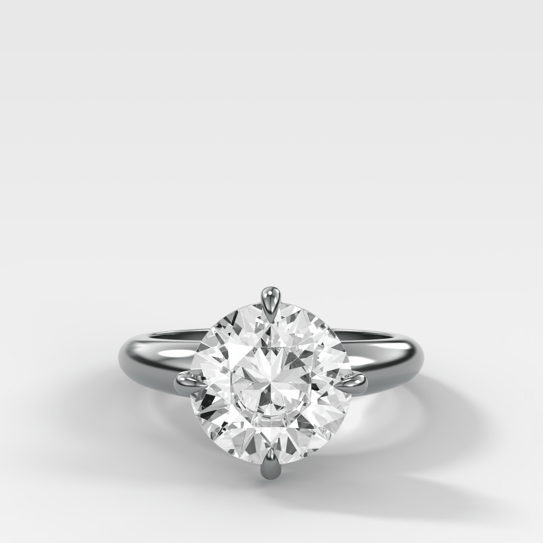 Compass Tapered Dome Engagement Ring With a Round Diamond