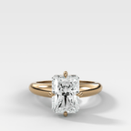 Compass Tapered Dome Engagement Ring With an Elongated Radiant Diamond