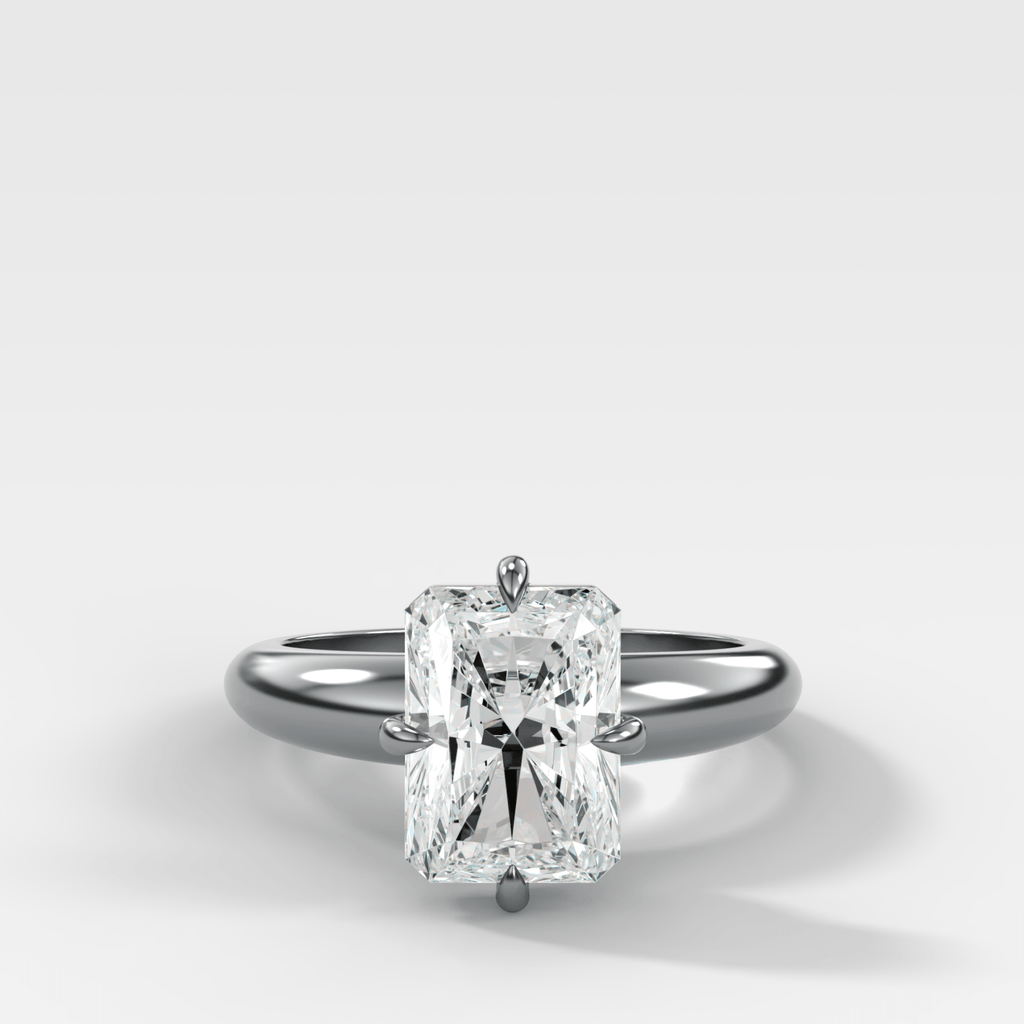 Compass Tapered Dome Engagement Ring With an Elongated Radiant Diamond