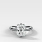 Compass Tapered Dome Engagement Ring With an Elongated Radiant Diamond