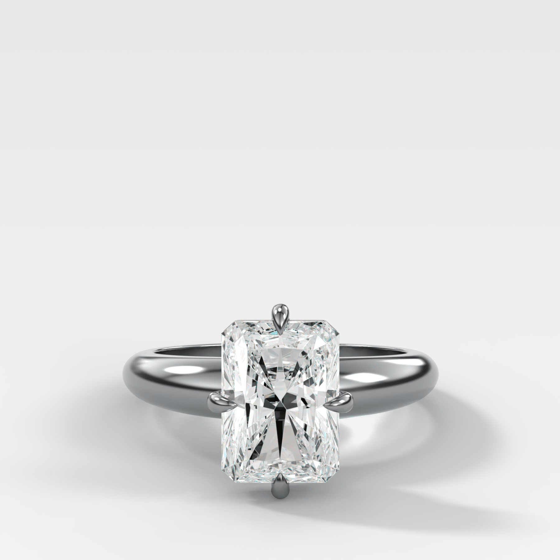 Compass Tapered Dome Engagement Ring With an Elongated Radiant Diamond
