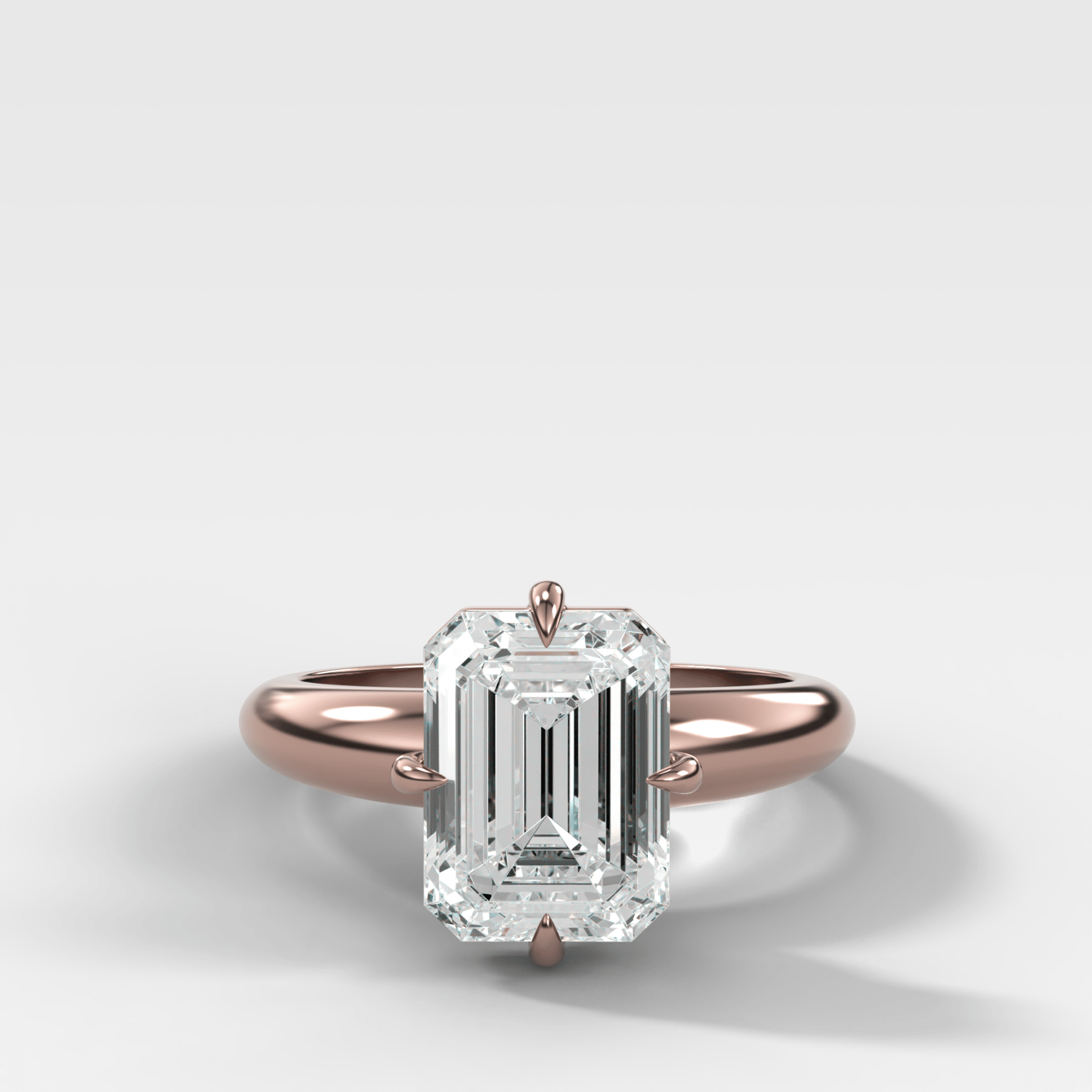 Compass Tapered Dome Engagement Ring With an Emerald Diamond