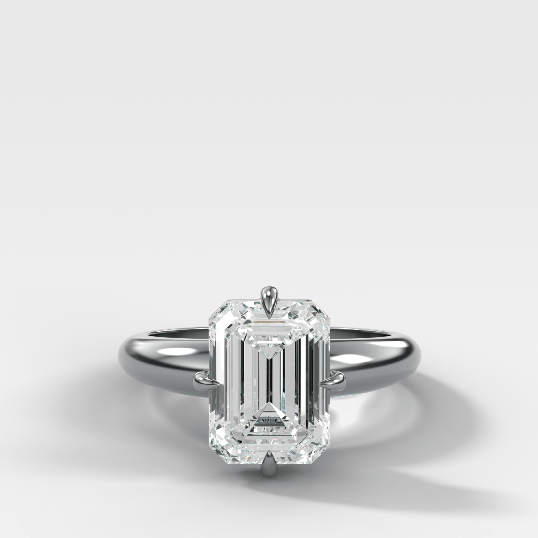 Compass Tapered Dome Engagement Ring With an Emerald Diamond